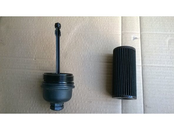 Sortir le vieux filtre en le tirant en arrière.