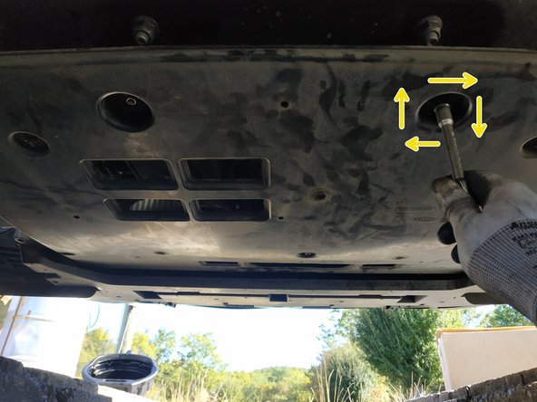 poser la protection sous-moteur, clé de 10mm, 7 vis et 2 écrous