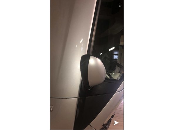 Reposez le rétroviseur