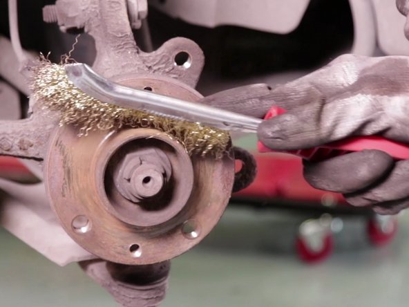 
Once the disc is removed, clean the wheel hub using a wire brush
