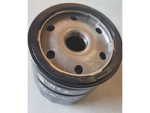 Utilisez cette huile pour huiler le joint du filtre neuf.