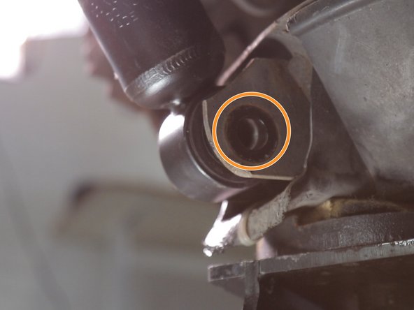 Replacer le bas dans l'amortisseur dans son logement