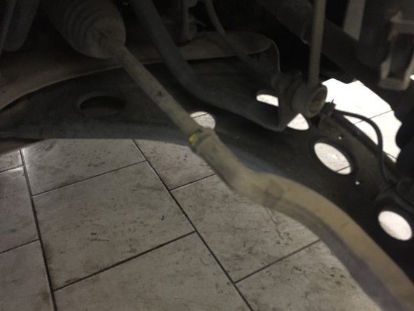 Dévisser l’écrou de 21 à l'aide de la clé plate