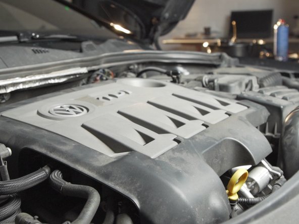 Replacer le cache moteur