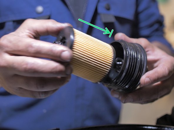 Replacer le nouveau filtre à huile dans sa cloche