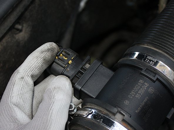 Remettre en position le clip de blocage jaune.