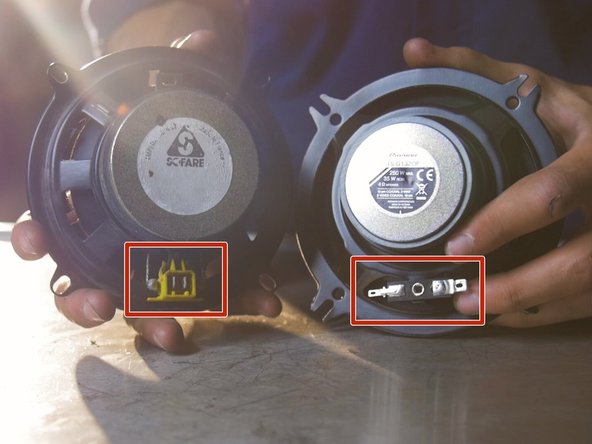 
The new speaker should have a magnet on the back and 4 ears to accommodate the 4 mounting screws
