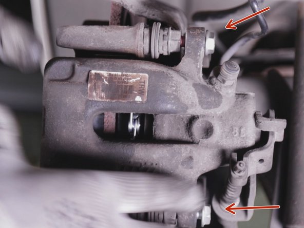 Bloquer les 2 vis de l’étrier