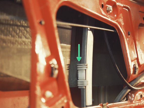 
Lower the window until you see the window support
