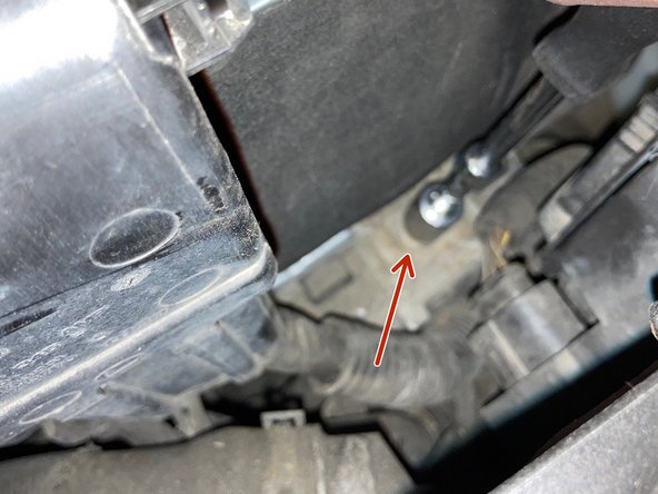 Prenez votre cliquet, utilisez une douille de 13 avec une rallonge.