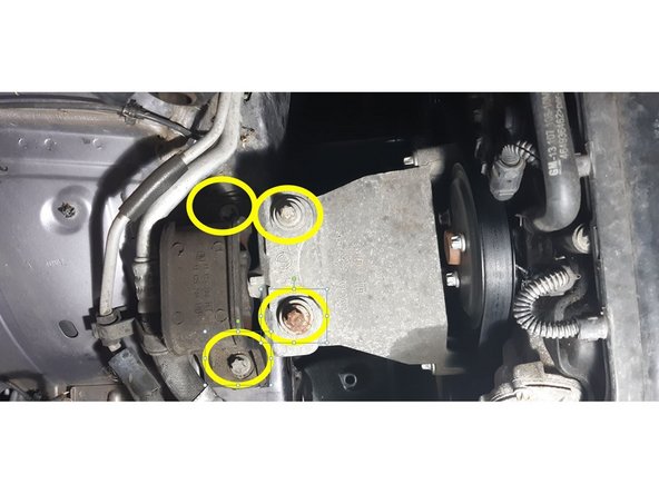 dévisser le support moteur côté passager puis le silent bloc (douille de 13)