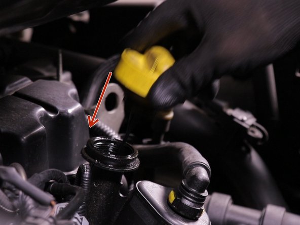 Replacer la jauge et visser le bouchon