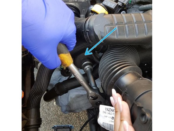 Placer un bac de récupération d'huile sous celui-ci.