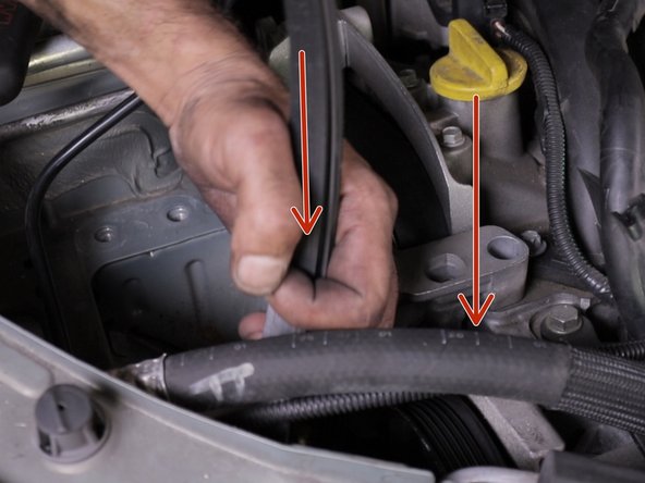 Reposer la courroie d'accessoires selon selon le schéma à l’étape 19