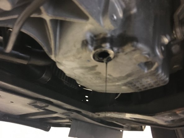 Remonter le bouchon de vidange avec le joint cuivre neuf