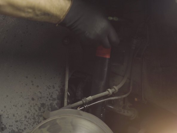 Replacer l'amortisseur dans son emplacement