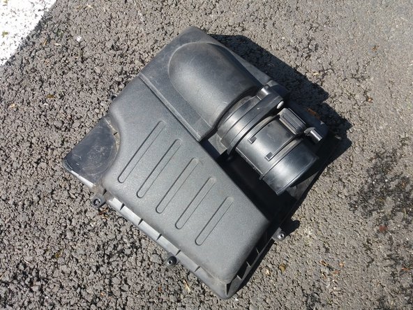 Sortir l'ancien filtre à air de la boite.