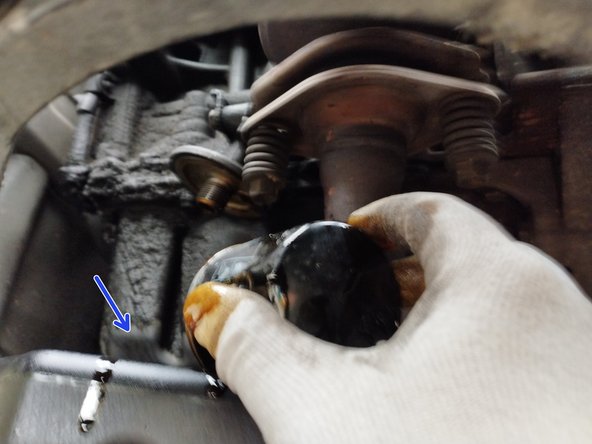 finir de dévisser à la main et retirer le filtre