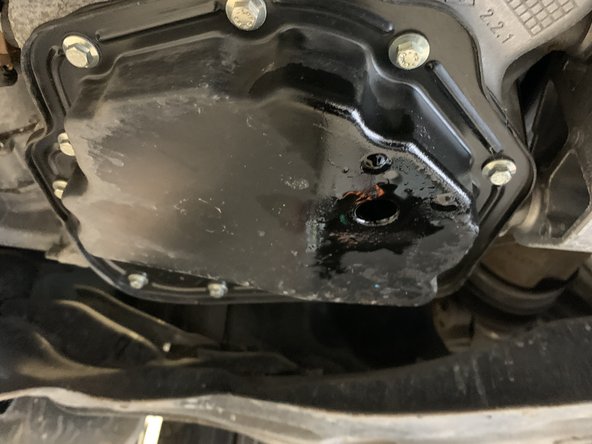 Laisser couler l'huile jusqu'au goutte à goutte