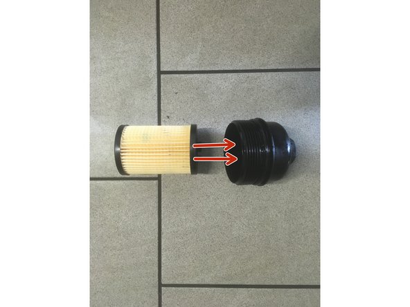 Remettre le filtre à huile dans la cloche en le clipsant