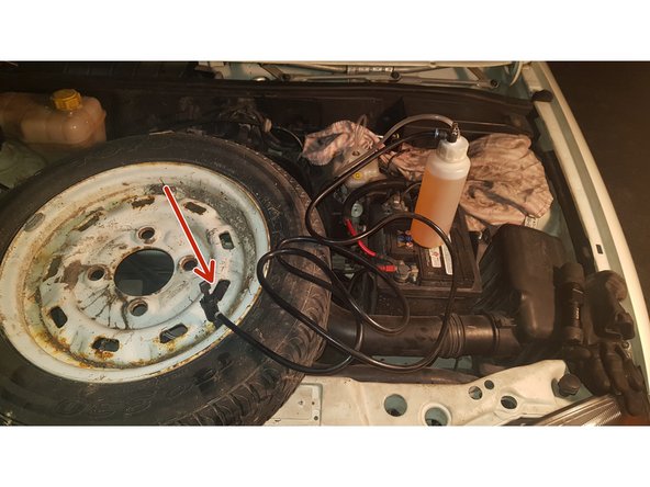 Reliez votre système de purge à un objet sous pression.