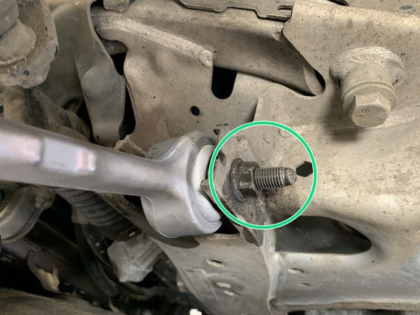 Serrer l'écrou de 18