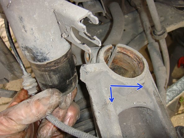 
Rotate back to spread the spindle and remove the shock absorber
