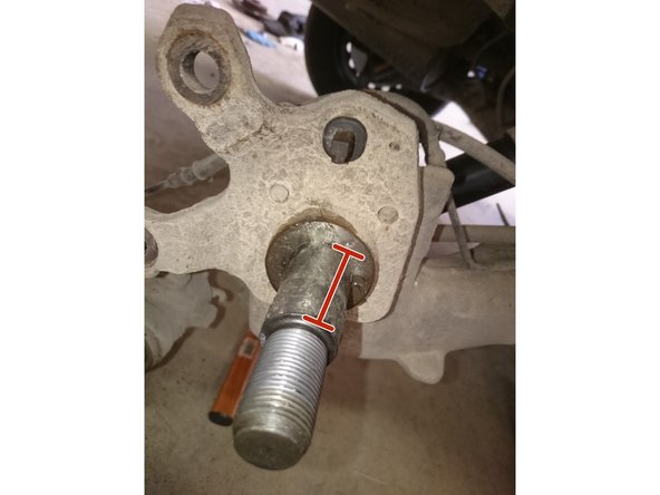 Mettre un peu de graisse sur la sufrace de contact avec le roulement. Photo 2