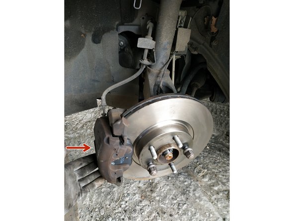 libérer l'étrier (on l'avait suspendu) et le mettre en place