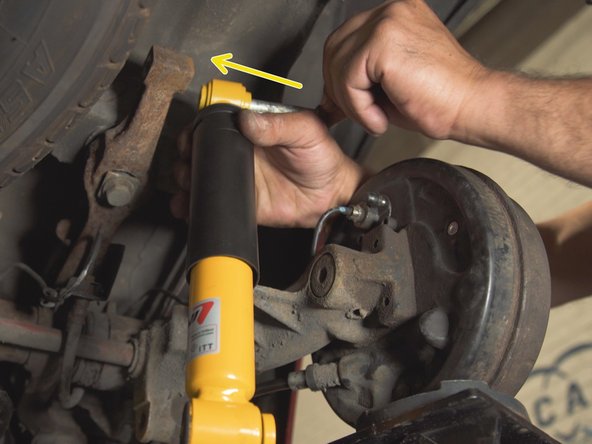 
Place the shock head on the top location and thread the screw into the shock
