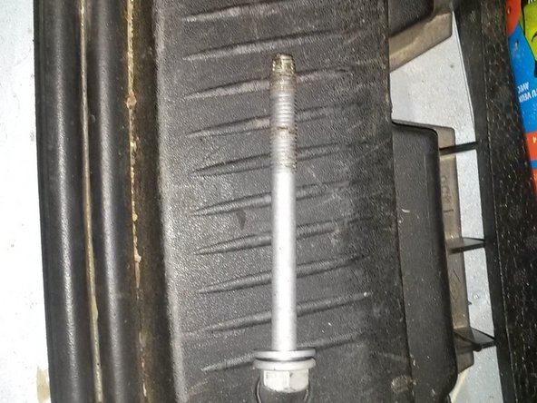 Vis de fixation de l'amortisseur.