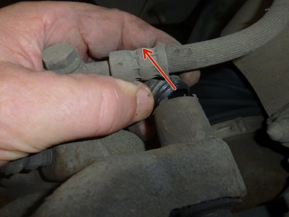 Enlever les capuchons de protection des vis de fixation de l'étrier.