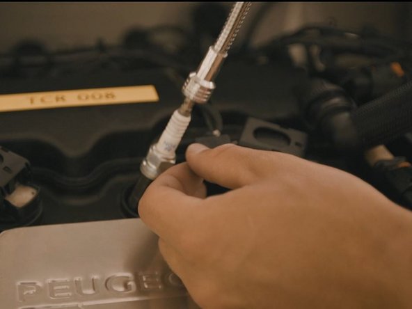 à l'aide d'un aimant, retirez la bougie