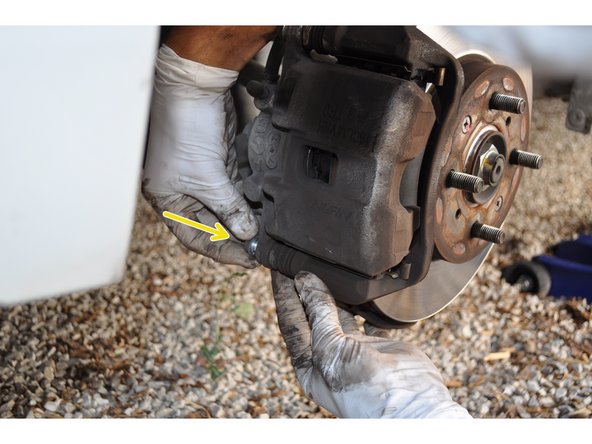 
Replace the brake caliper and mounting screws with threadlocker.
