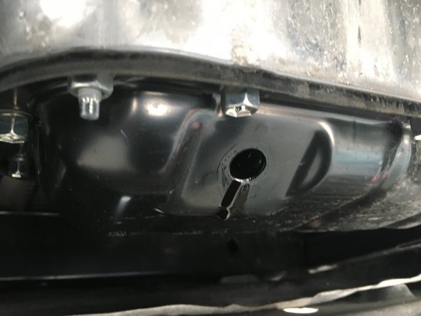 Remettre le bouchon de vidange en changeant le joint de vidange