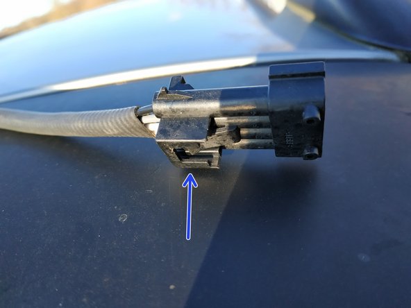 
the probe is fixed to the car via a clip system; you will have to use a small flat screwdriver to lever it and pull it gently towards you to release it
