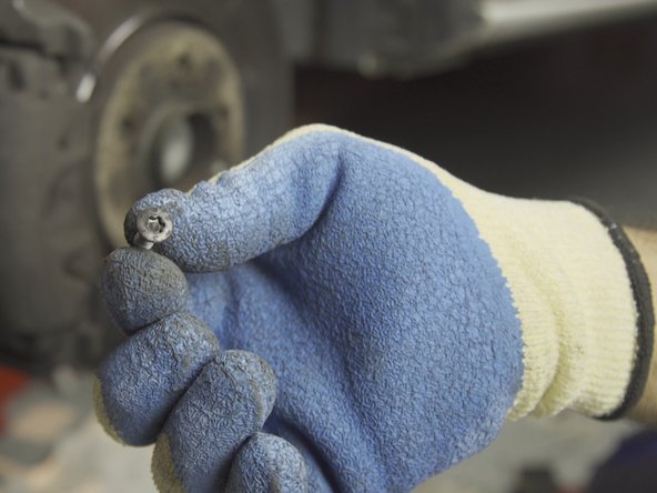 Dévisser la vis de maintien du disque