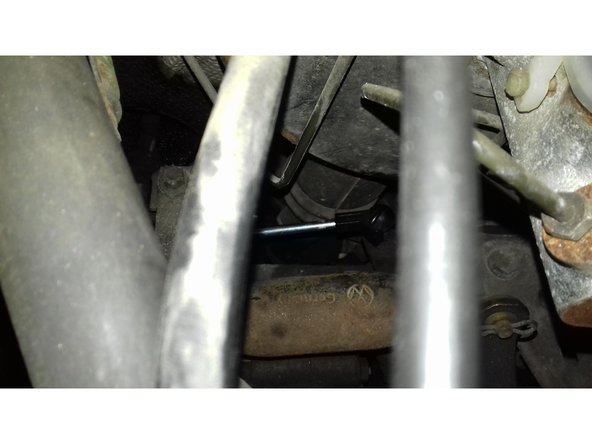 Passage de la biellette au milieu des divers commande de boite.