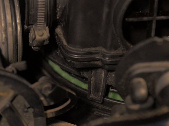 
Replace the air box cover on the filter
