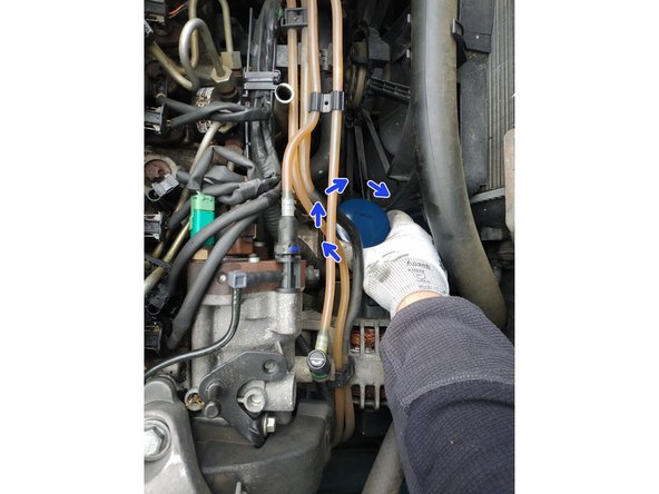 serrer le filtre à la main