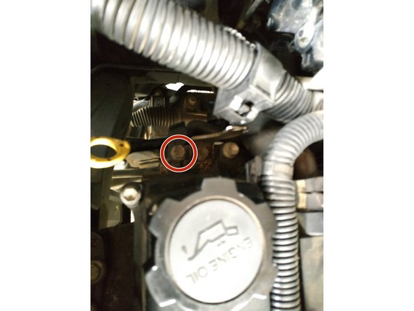 remettre le tube de jauge en place et le visser, clé de 10mm