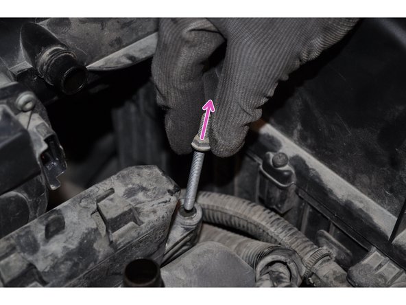 Déposer la première vis colonnette.