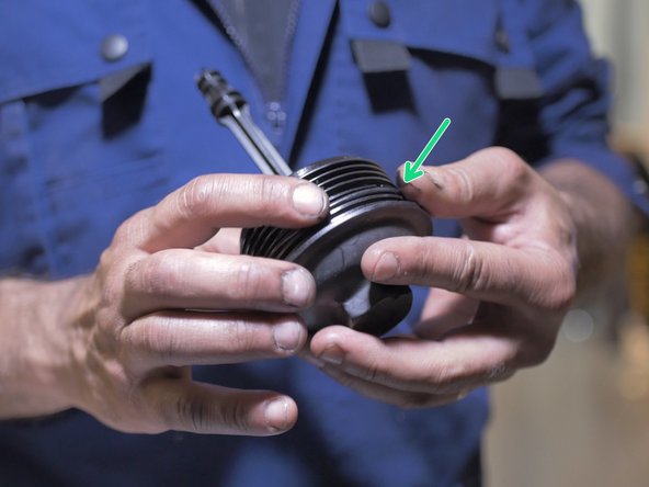 Replacer le nouveau joint sur la cloche