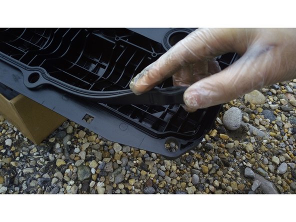 Insérer les nouveaux joints dans leur fente