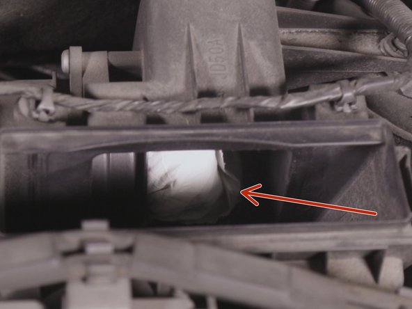 Protéger le conduis d'admission avec un chiffon