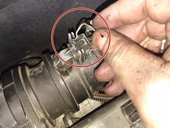 Remettre la boite a air et rebrancher la prise .