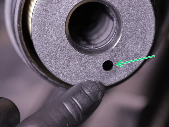 Le guide dois venir se loger dans le trou du filtre à huile