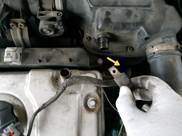 
remove the suppressor from the coil and put it aside
