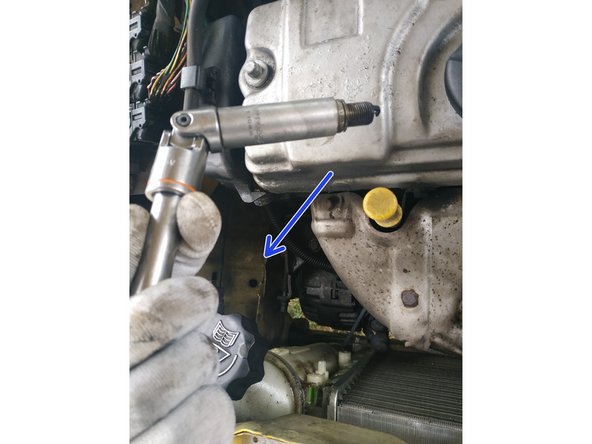
unscrew the spark plug using the ratchet wrench, small extension, universal joint and 16mm long socket
