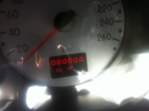 
Put the car back on its wheels, making sure it is level.
